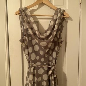 This polka-dotted sleeveless number by Dress Barn is perfect for Spring/summer.